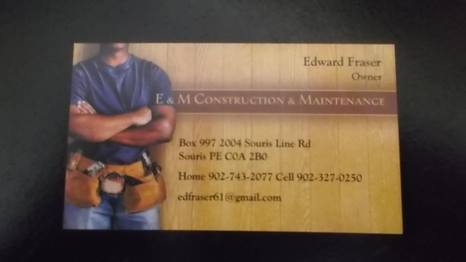 E&M Construction & Maintenance logo